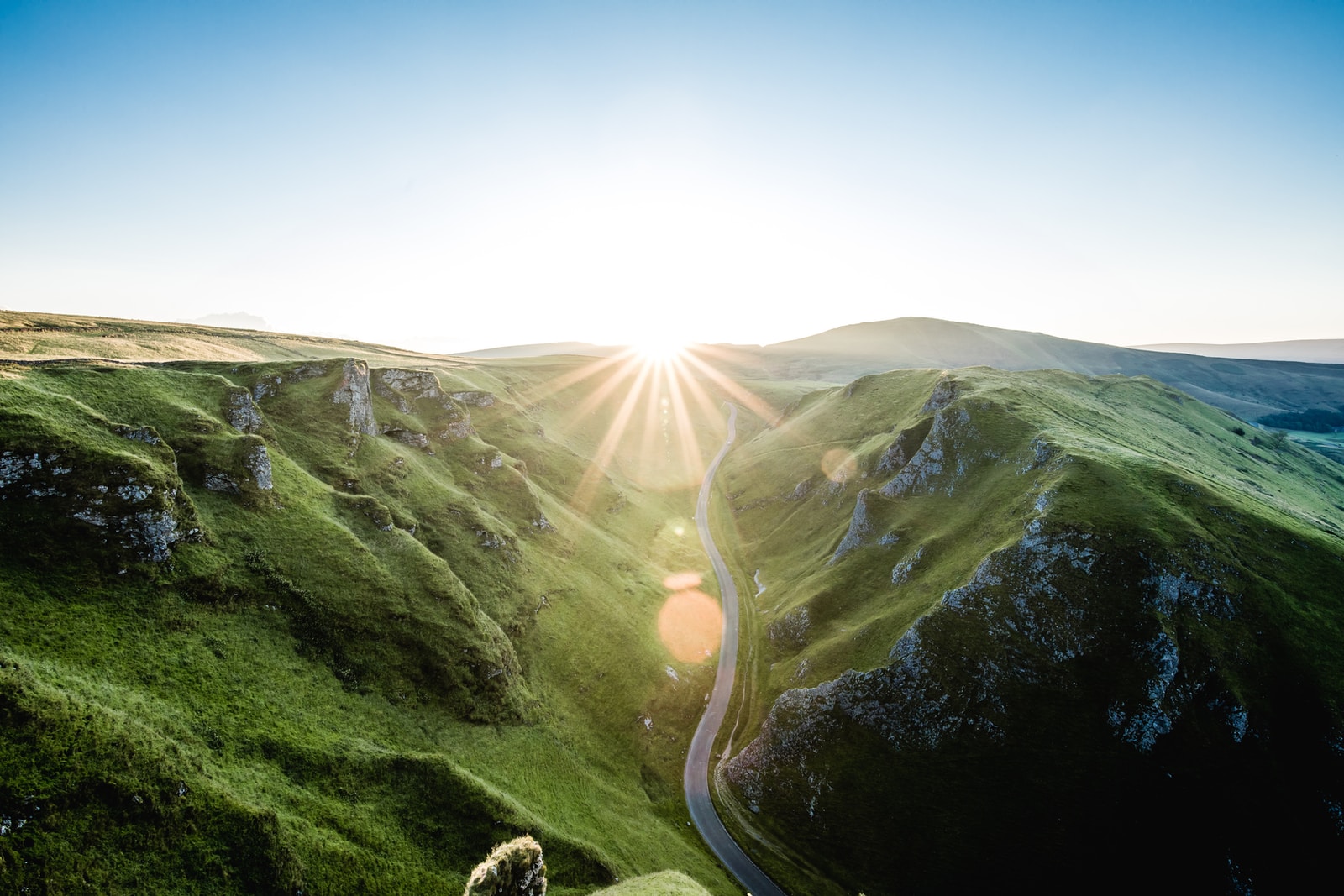 Photo by Grant Ritchie aerial view of grass mountains
